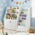 Keezi Kids Bookshelf & Storage Organiser, White – 3-in-1 Design with Sling Pouches, Shelves & Drawer, 91x39.5x80cm Keezi Kids Bookshelf & Storage Organiser, White – 3-in-1 Design with Sling Pouches, Shelves & Drawer, 91x39.5x80cm