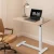 Artiss Adjustable Mobile Laptop Desk 70CM - Pneumatic Height Control, L-Shaped Frame, Hidden Casters, Oak/White