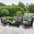 Gardeon 4-Piece Rattan Outdoor Sofa Set with UV-Resistant Wicker, Steel Frame, Cushions, and Tempered Glass Table